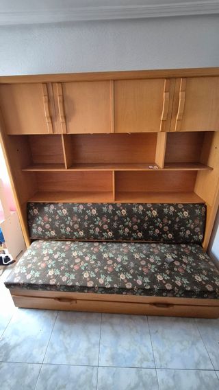 Sofá cama nido con estanterías