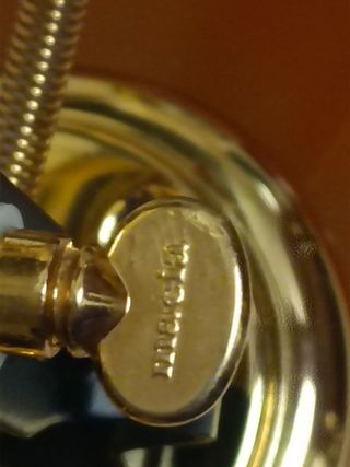 Aplique Macia dorado metal