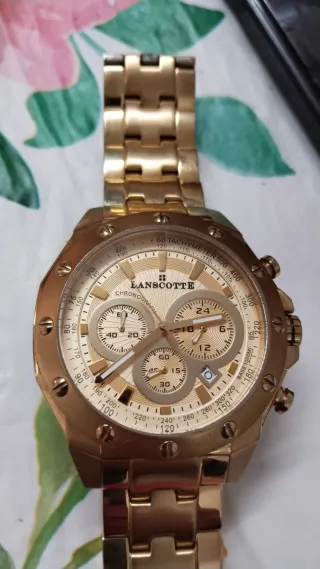 Reloj LANSCOTTE DORADO"SIN NINGUN RAYON"EN LA PANT