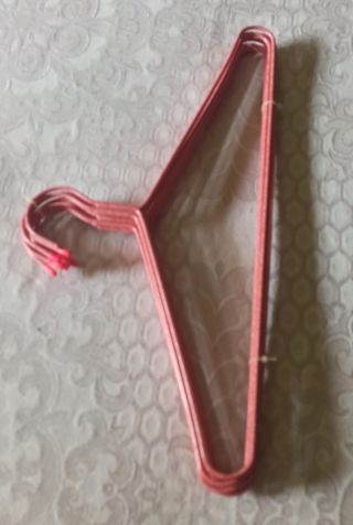 Perchas Plásticas Rosa-Rojas