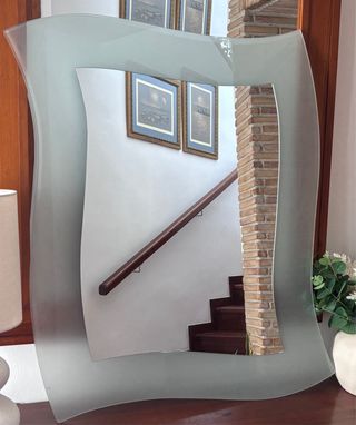 Espejo decorativo curvado
