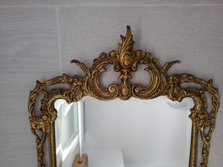 Espejo dorado antiguo