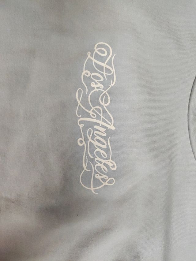 Top celeste con cordones