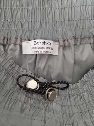 Conjunto deportivo reflectante plata