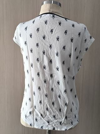 Blusa blanca estampada elefantes