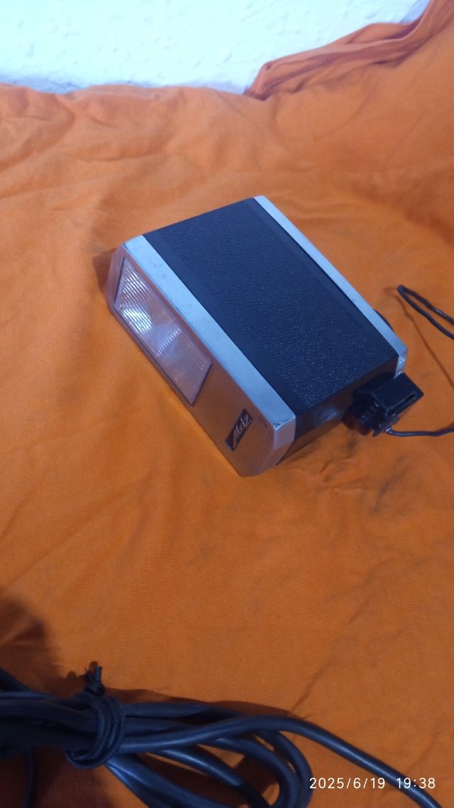 Exposímetro Weston Master y flas Metz