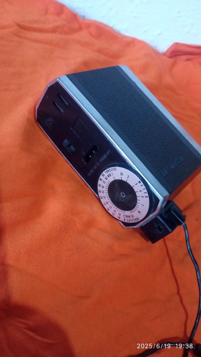 Exposímetro Weston Master y flas Metz