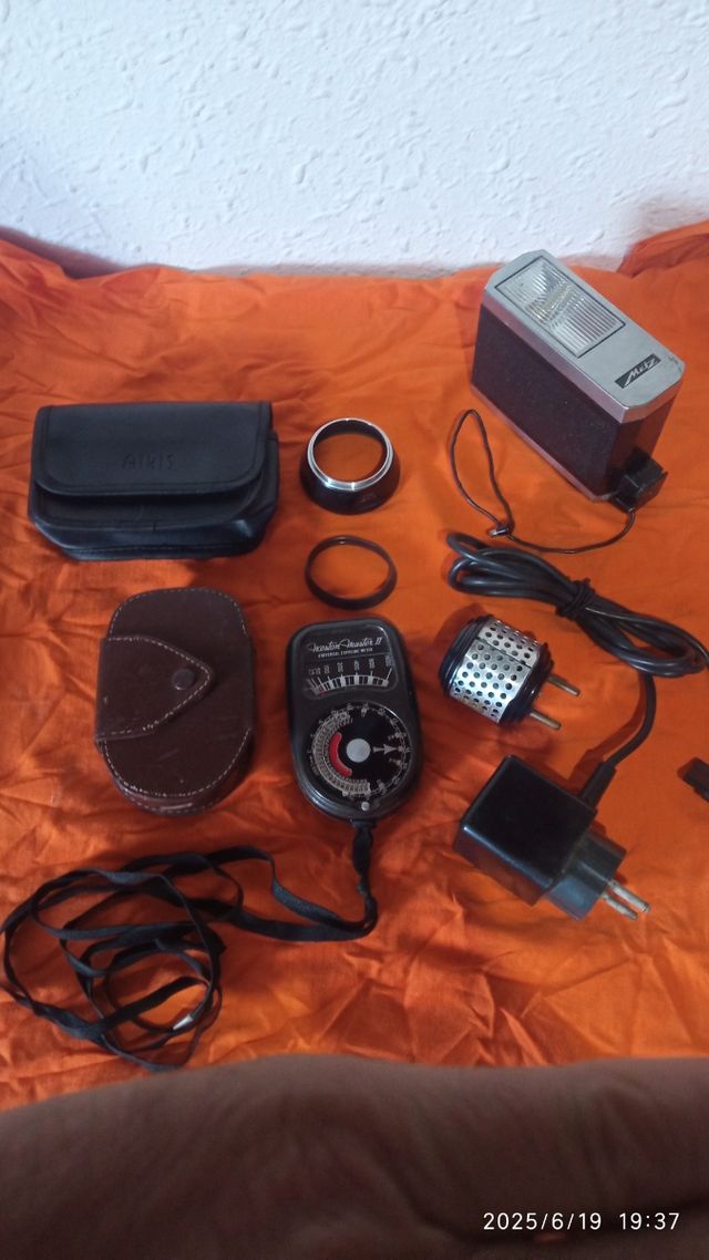 Exposímetro Weston Master y flas Metz