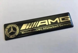 EMBLEMA AMG NEGRO SILICONA MERCEDES LOGO INT
