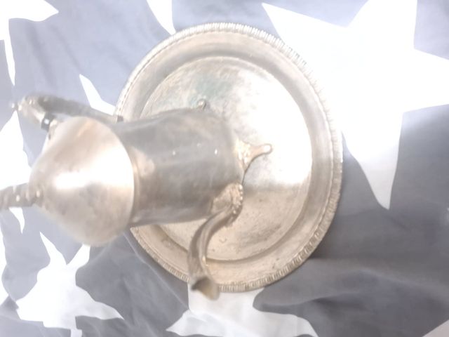 Tetera plata antigua con bandeja