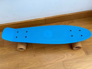 Monopatín azul infantil