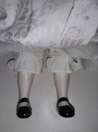 Bambola antica in porcellana