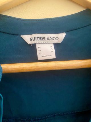 LOTE 10
Falda vaquera y blusa marca Blanco.