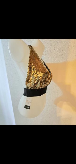 Top negro y dorado brillante
