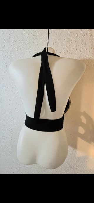 Top negro y dorado brillante