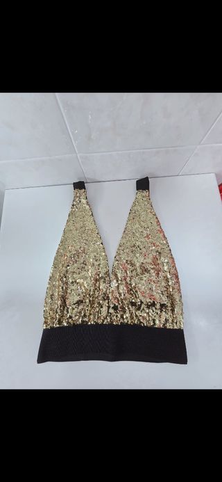 Top negro y dorado brillante