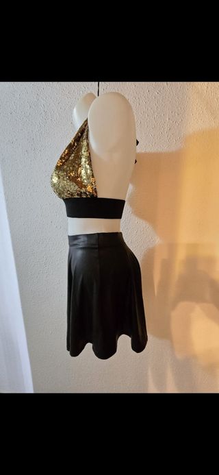 Top negro y dorado brillante