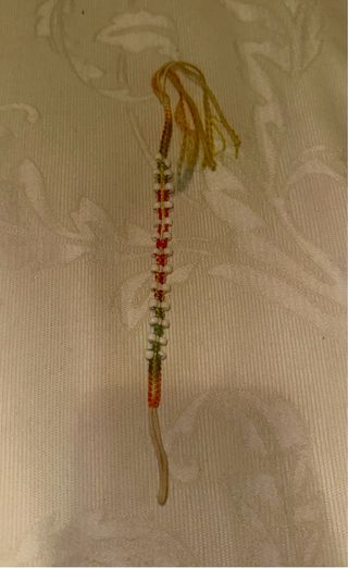 Pulsera tejida multicolor