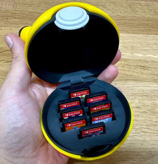 Soporte caja Nintendo Switch 1 2 Pokeball Pikachu