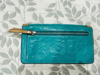 Cartera grande de piel azul turquesa.Solo envio
