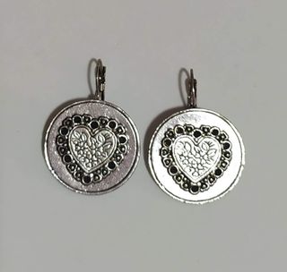 Pendientes corazón plateado, a estrenar