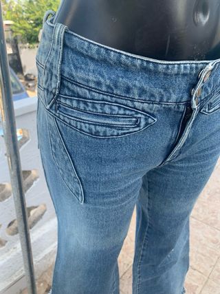 Vaqueros acampanados azules