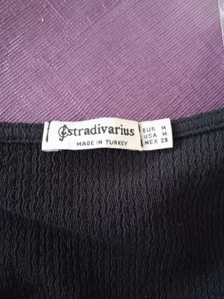 Blusa negra peplum manga corta