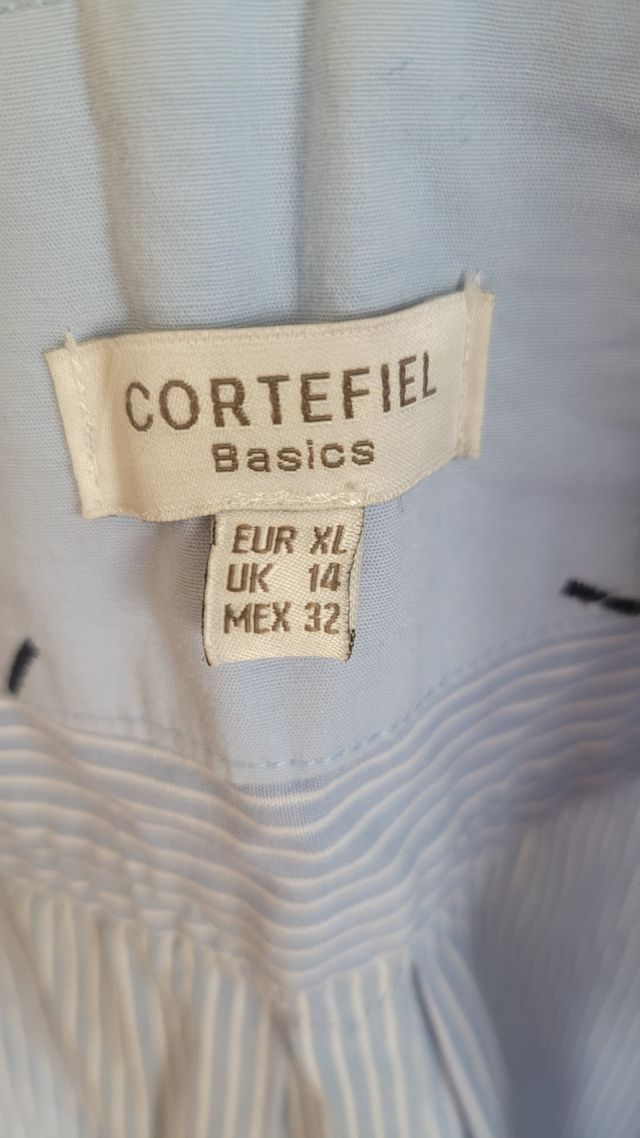 Blusa a rayas azul y blanca