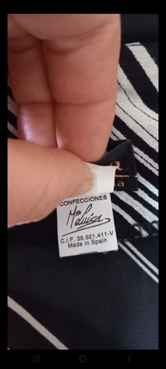 Camisola negra y blanca, nueva, sin estrenar.