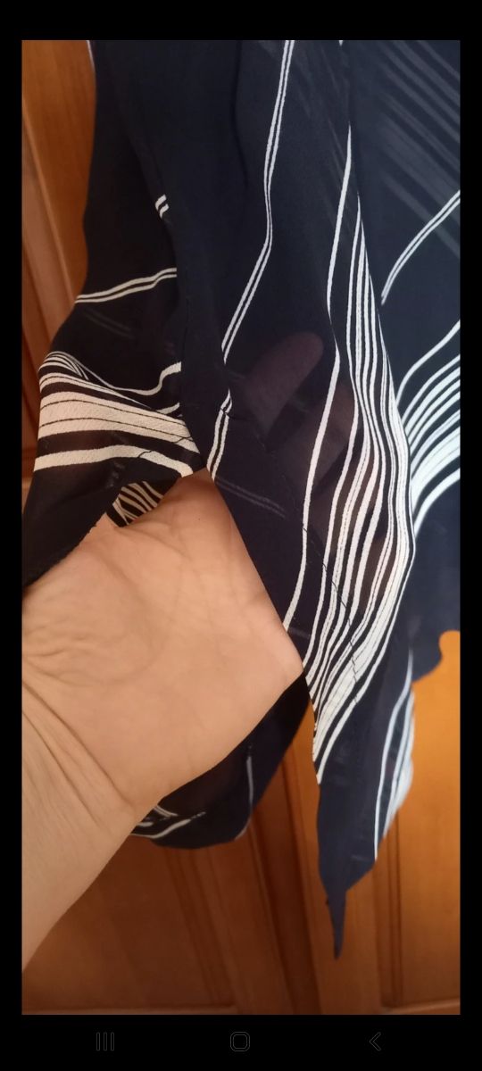 Camisola negra y blanca, nueva, sin estrenar.