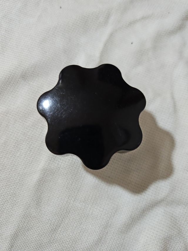 Pomo giratorio de presion plástico negro