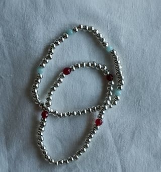 Pulseras elásticas plata-granate