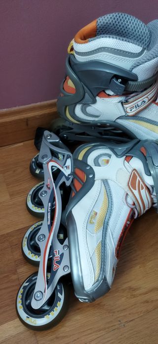 2 pares patines línea, 2 bolsas, 8 repuestos 76mm