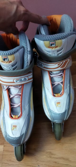 2 pares patines línea, 2 bolsas, 8 repuestos 76mm