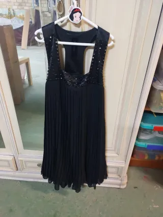 Vestido negro fiesta plisado,con chaqueta torerita