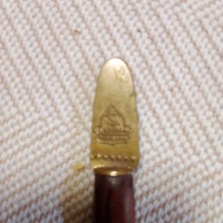 Abrecartas antiguo de latón