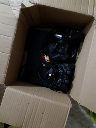 PS3 (PlayStation 3) con 8 juegos