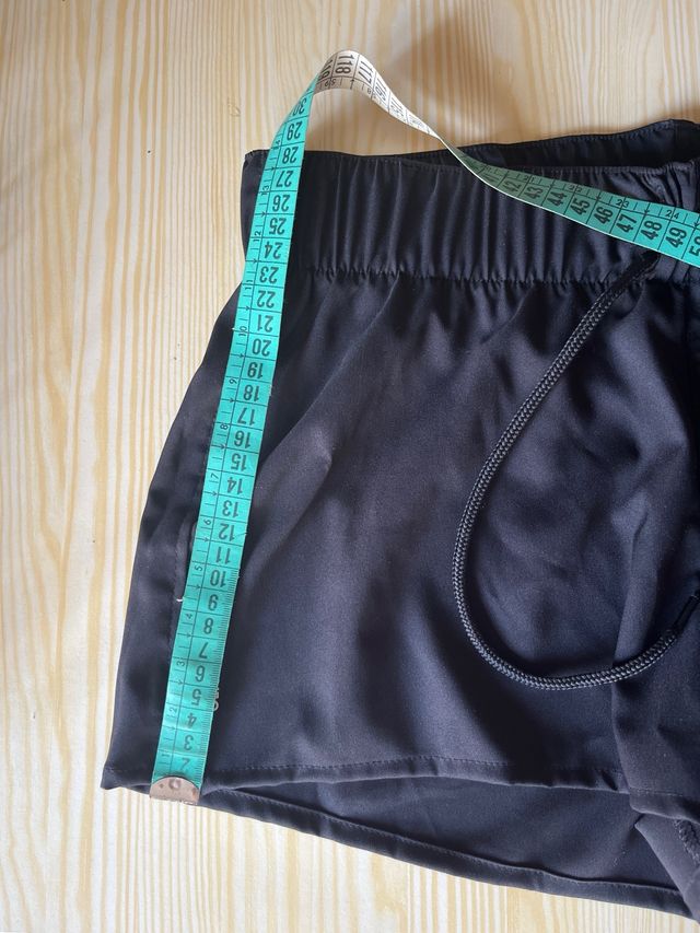 Shorts deportivos impermeables. Olaian.