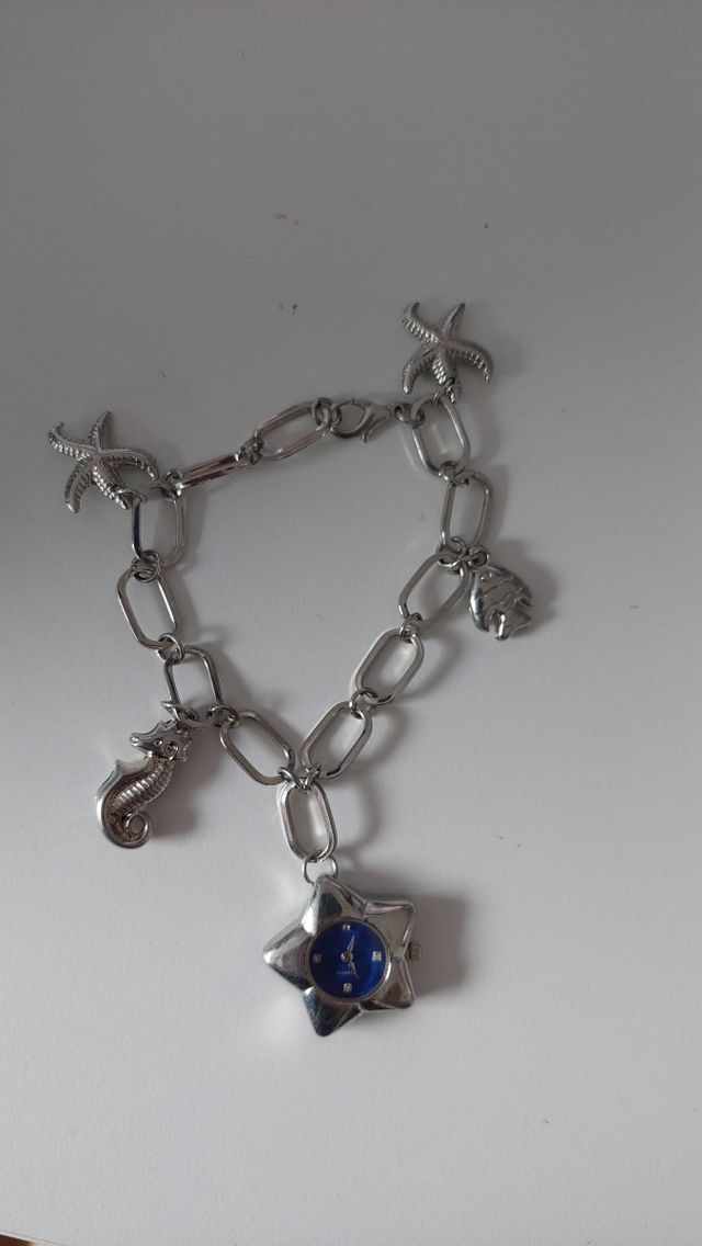 Pulsera reloj plata con estrellas