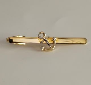 Gemelos y pisa corbata dorados