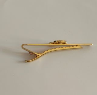 Gemelos y pisa corbata dorados