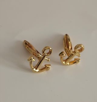 Gemelos y pisa corbata dorados