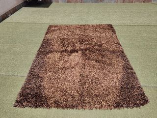 Alfombra marrón -