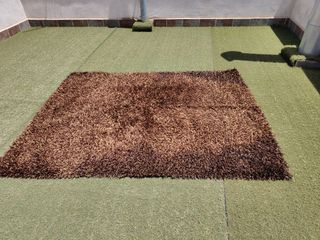 Alfombra marrón -