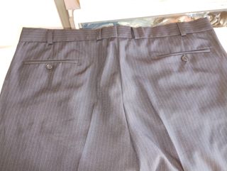 Pantalón CAN-DA azul marino a rayas 58
Con chaquet