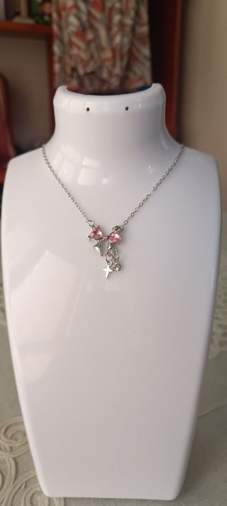 Collar con lazo rosa y estrellas