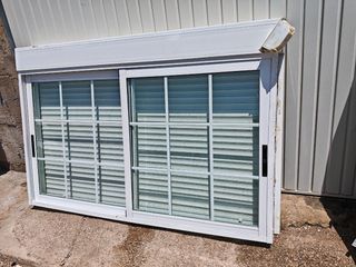 2 Ventanas correderas con barrotillos 