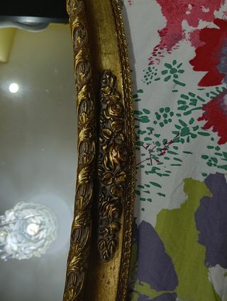 Espejo ovalado dorado madera tallada