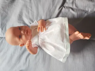 Muñeca y mucho accesorios