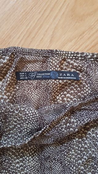 Top asimétrico animal print